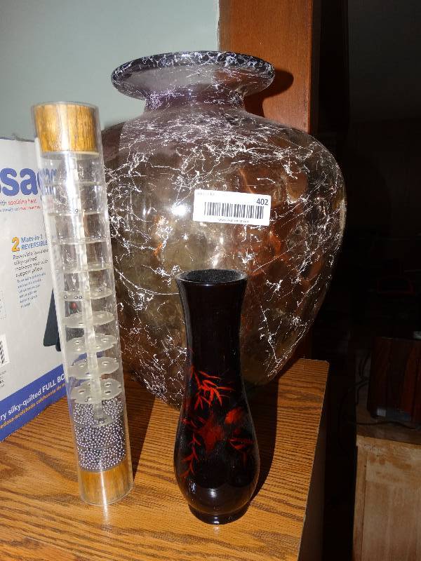 lot 402 image: Large Glass Vase, Lacquered Wood Vase, & Tabletop Rain Stick.