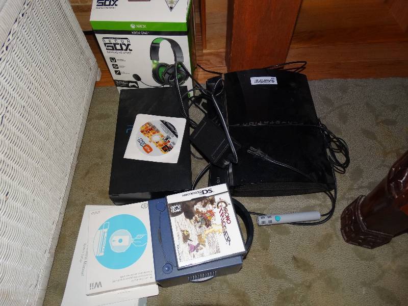 lot 405 image: Play Station 3 wAccessories, Nintendo Game Cube wGame, Play Station 2 wGame CD, Wii Cleaning Kit & Manuals, Recon 50X Gaming Head Set.