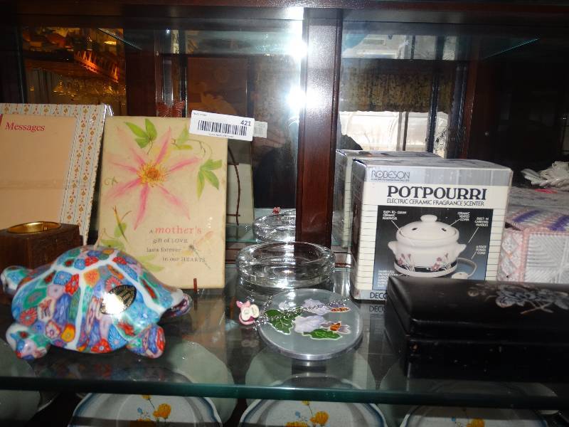 lot 421 image: All Collectibles & Decor on Middle Shelf of China Hutch.