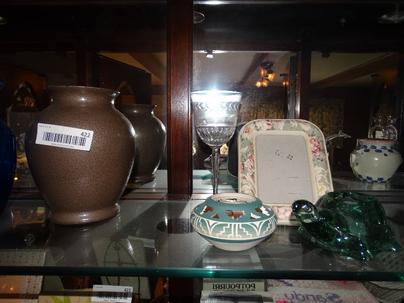 lot 422 image: All Collectibles & Decor on Top Shelf of China Hutch.