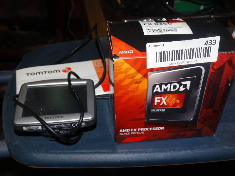 lot 433 image: AMD FX Processor & Tomtom wManual.