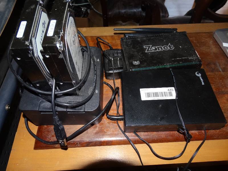 lot 435 image: Seagate Expansion Desktop Drive, Zonet Wireless Broad Band Router, StarTech Dual DriveDocking Station wContents.