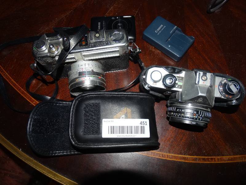 lot 451 image: Lot of Cameras - Pentax, Yashica, Canon, Kodak & Canon Battery Charger.