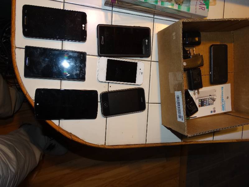 lot 466 image: Lot of Cell Phones & Chargers - LG, Apple, Nexus. And Screen Guards, & Motorola Charge Pack.