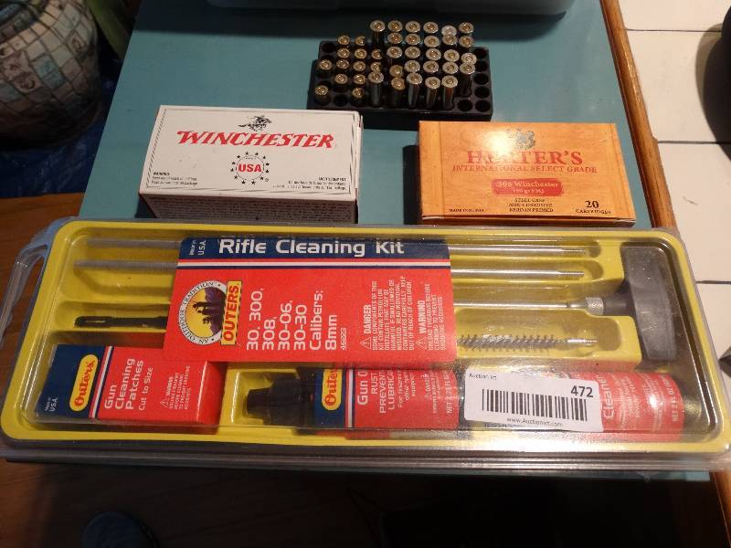 lot 472 image: Rifle Cleaning Kit, Box of Winchester 9mm Luger Bullets, Box of Herters .308 Winchester Bullets, Rack of Misc. Bullets.