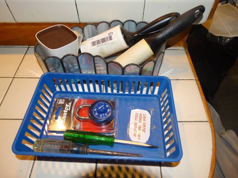 lot 473 image: Glass Planter, Lint Roller, Small Speaker, Combination Lock, Tools.