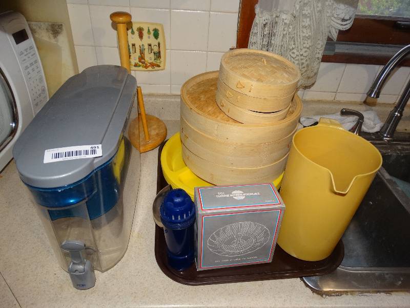 lot 491 image: Water FilterDispenser, Bamboo Steamer Set, Trays, Pitcher, Collender, Paper Towel Holder.