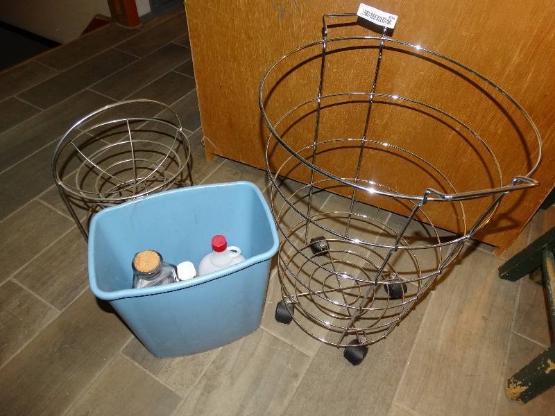 lot 496 image: Rolling Laundry Basket, Tabletop Double Basket, Trash Can, Soap, Lotion, Perfume.