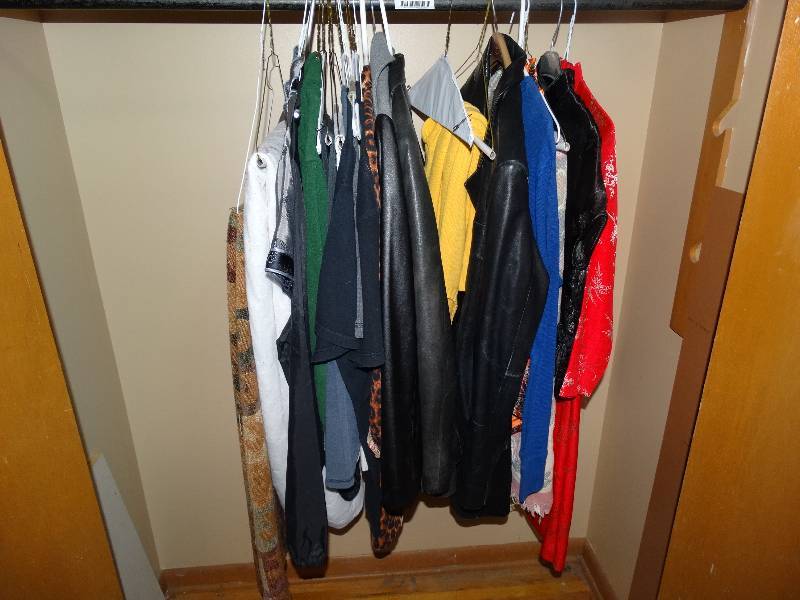lot 930 image: All Clothing & Blankets in Entry Hall Closet.