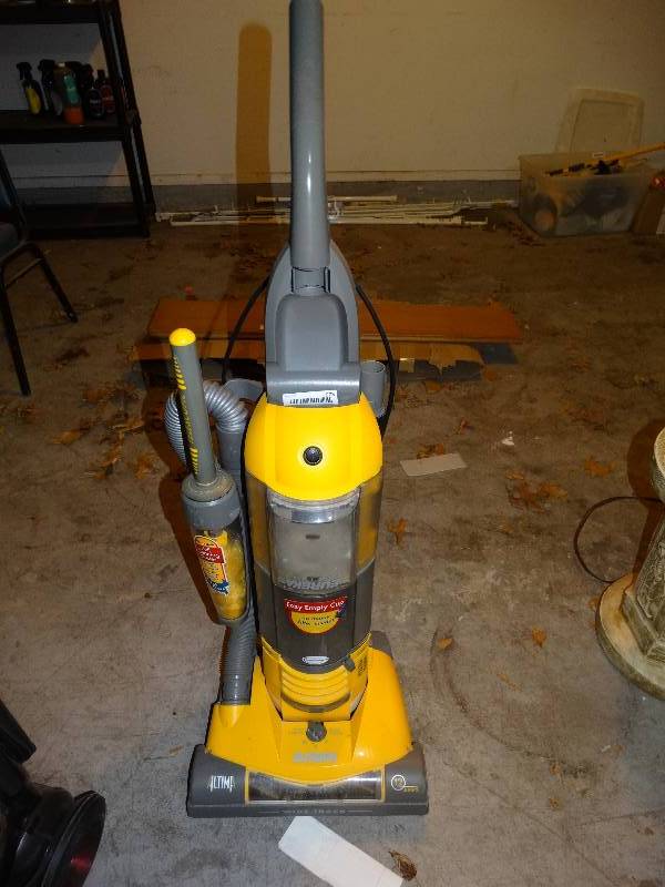 lot 973 image: Eureka Altima Bagless Wide Track Vacuum.