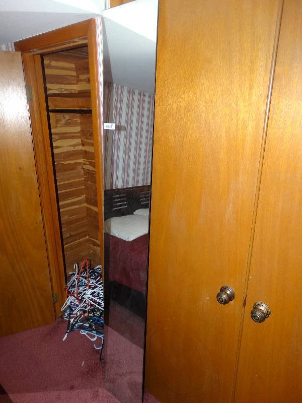 lot 1092 image: Tall Mirror & Large Lot of Hangers in Closet.