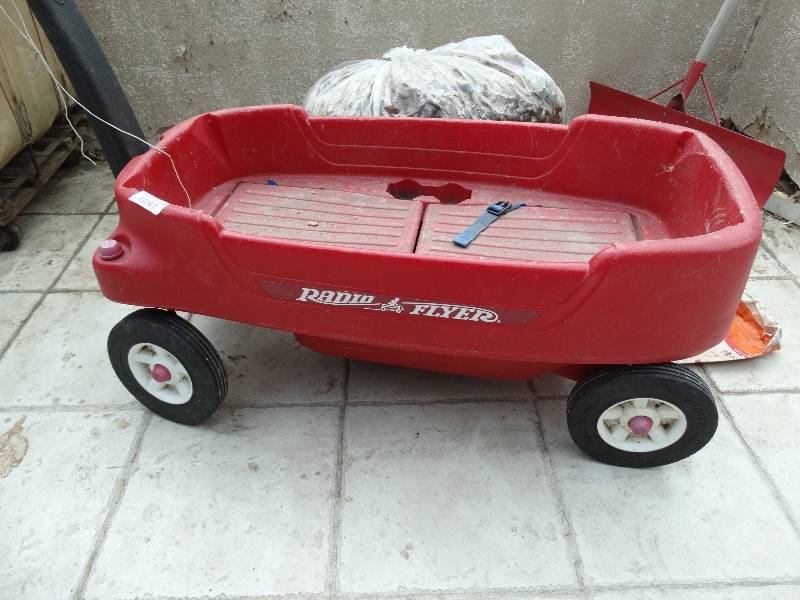 lot 1113 image: Radio Flyer - Red Plastic WagonGarden Cart.