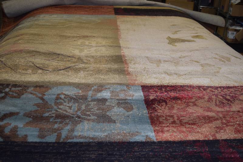 lot 2 image: Area Rug