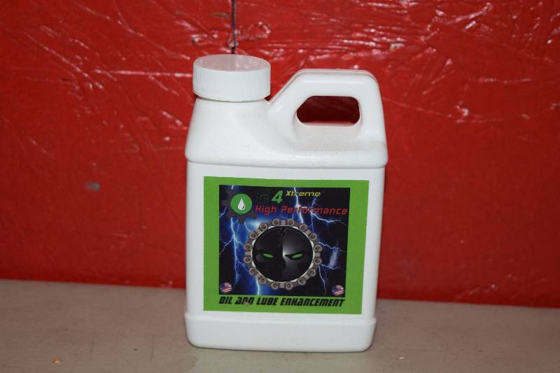 lot 355 image: 12 Bottles G4 Xtreme High Performance Oil and Lube Enhancement