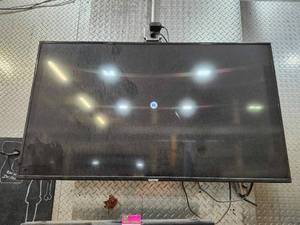 lot 49193 image: 52in Flat Screen TV with Wall Mount And Isignia Sound Bar&nbsp