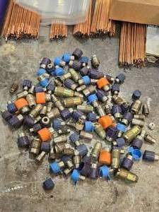 lot 49098 image: Lot of Used AC Service Port Caps and Fittings