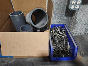 lot 49296 image: Industrial PVC Pipe Fittings and Metal Clamps Lot