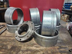 lot 49310 image: Industrial Steel Pipe Flanges and Spacers Set