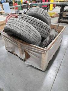 lot 34466 image: Used Goodyear Eagle P225 75R15 Tires with Rims &amp Contents of Crate&nbsp