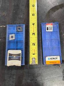 lot 34628 image: Korloy Carbide Cutting Inserts with Cases&nbsp