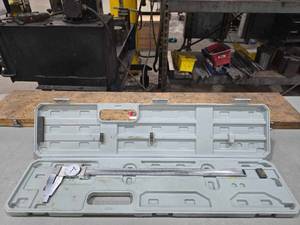 lot 36905 image: 24-inch SPI Dial Caliper with Case