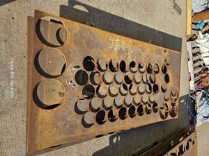 lot 50180 image: Industrial Steel Plates W Plasma Cut Outs