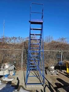 lot 50191 image: 12-Foot Industrial Rolling Safety Ladder