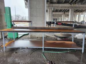 lot 50149 image: Industrial Heavy-Duty Workbench with Storage Shelf