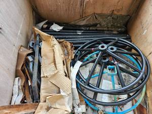lot 48081 image: Industrial 23in Wheels with Metal Pipes and Tools