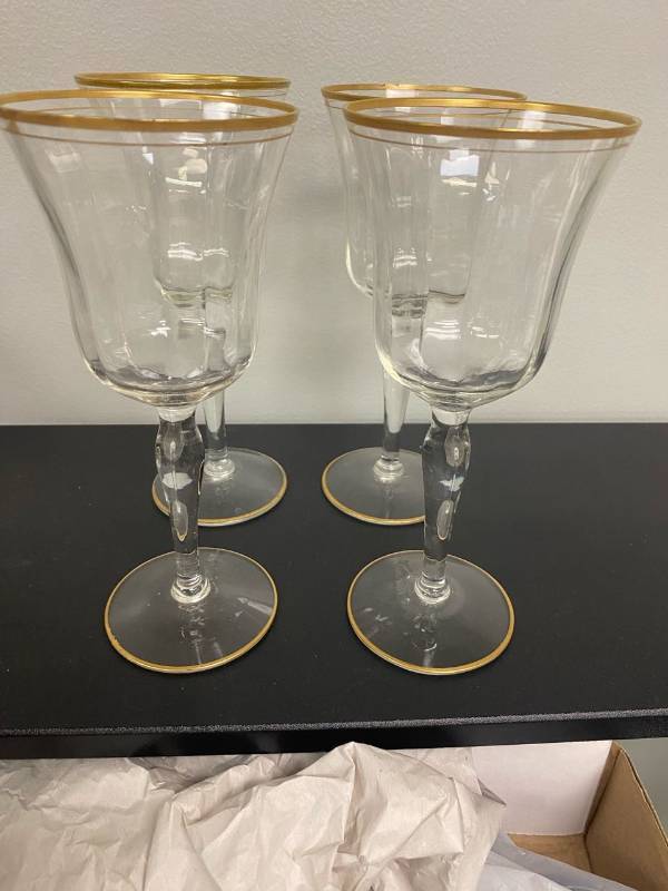 lot 2537 image: Set of (4) Antique long stemmed wine glasses with gold trim.