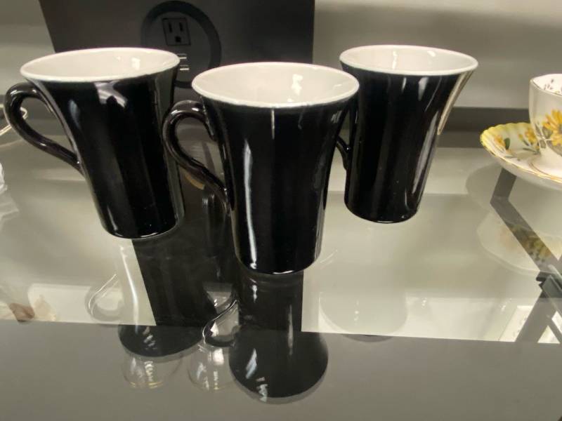 lot 2540 image: Set of (4) Black and white coffee mugs