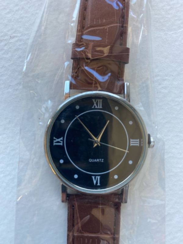 lot 2507 image: Brown and silver fashion watch- Factory sealed