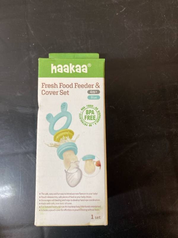 lot 1276 image: haakaa fresh food feeder and cover set in blue