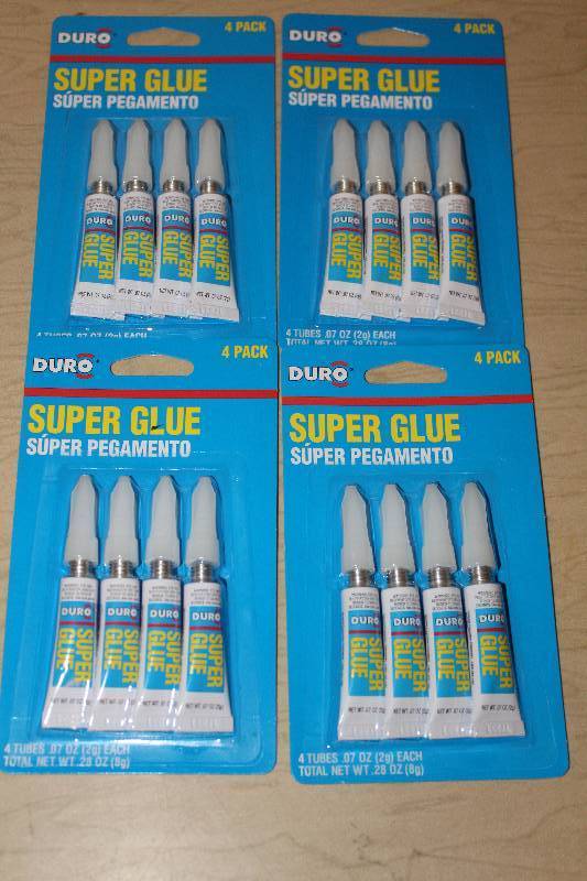 lot 7714 image: Lot of 4, 4 packs of Duro Super Glue- New in Package