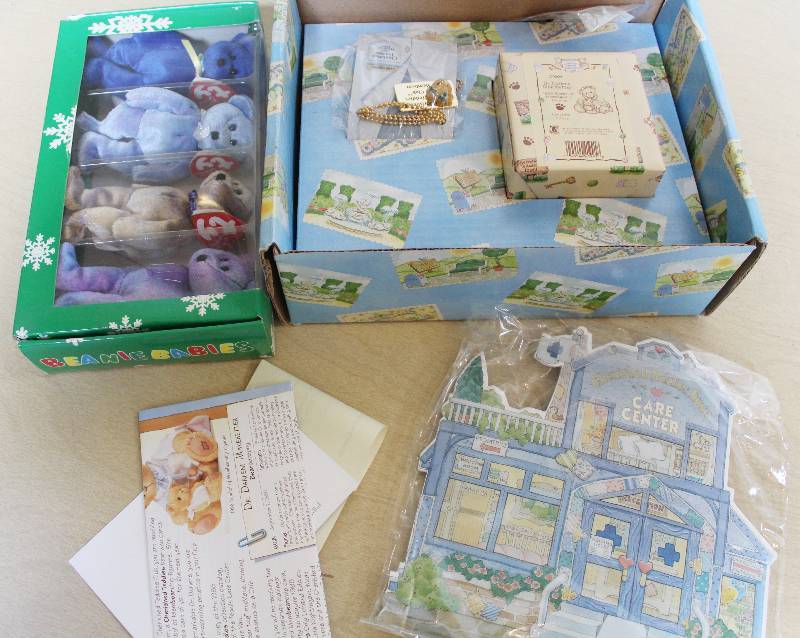 lot 8057 image: Cherished Teddies and TY Beanie Babies- Jungle Collection- Adorable