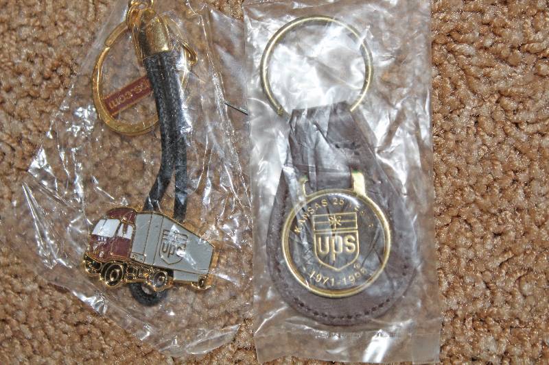 lot 7765 image: Lot of 2 UPS Keyrings