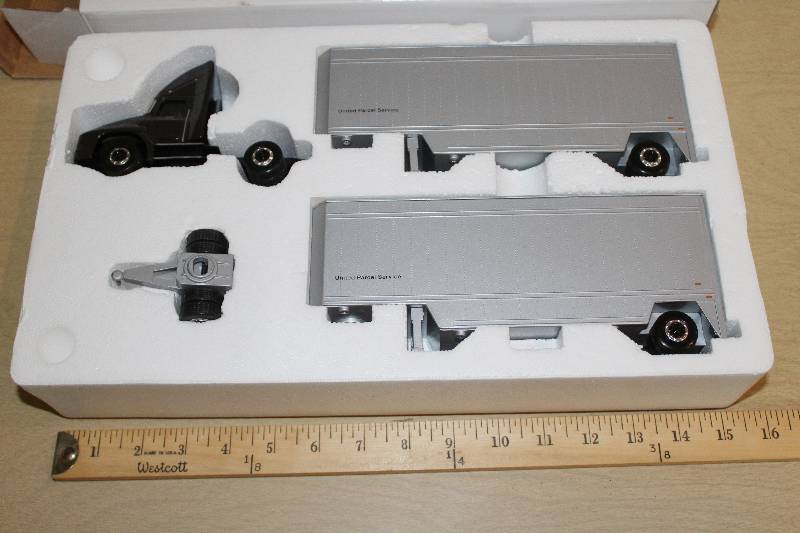 lot 8043 image: UPS - United Parcel Service- Die-cast Truck Replicas- Cool