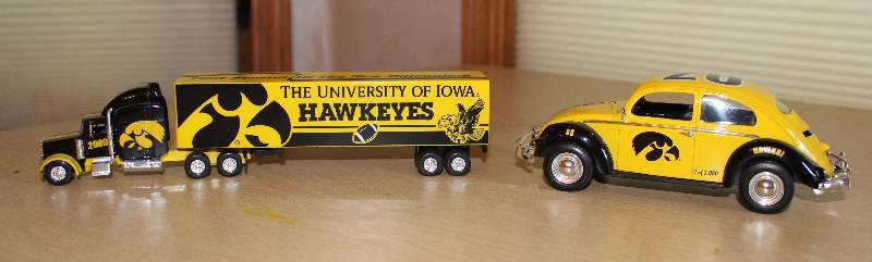 lot 8298 image: Lot of 2 Toys - IOWA Hawkeyes - Tractor Trailer Rig and Volkswagen Beetle - Great Memorabilia