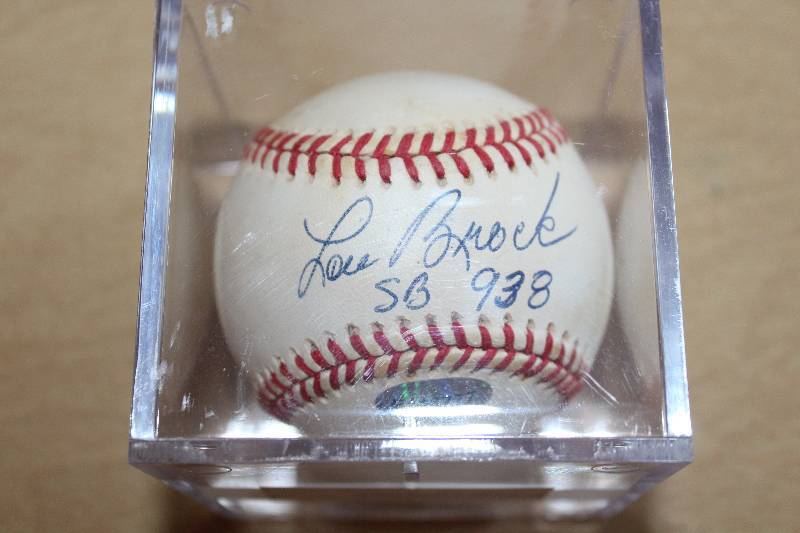lot 8299 image: Autographed Baseball Lou Brock - Marked SB 938 - In hard plastic case