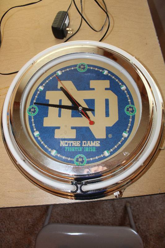 lot 8868 image: Notre Dame Fightin Irish - Light Up Wall Clock -works 14 Diameter See pics