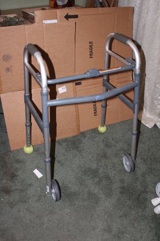 lot 5038 image: Invacare Walker - M# 6281-JR - Folds for Storage