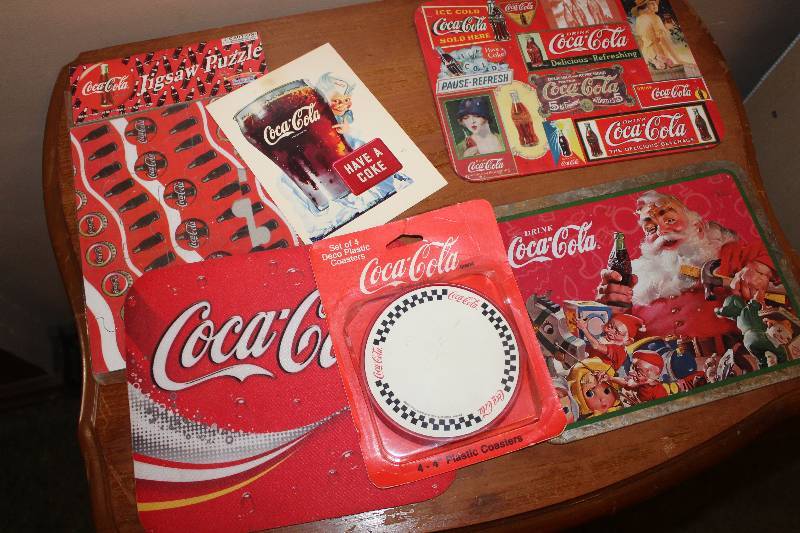 lot 5054 image: Coca Cola Lot - 2 Trivets, Post Cars, Puzzle, Mouse Pad and Coasters - see pics