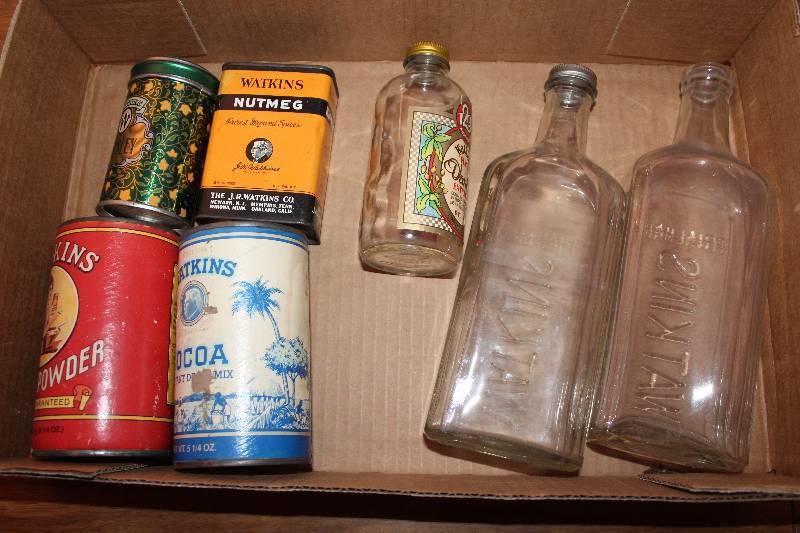 lot 8181 image: Lot of Watkins Tins and Bottles- How Neat