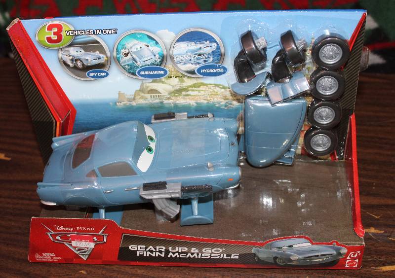 lot 8316 image: DISNEY CARS - Mattel Gear Up and Go - Finn McMissile - New in Original Package 3 Vehicles in One WOW