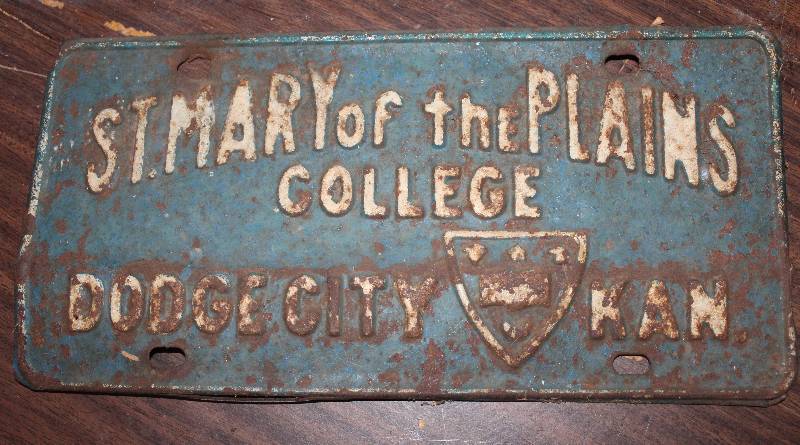 lot 8349 image: St. Marys of the Plains College - Pressed Steel Vanity Car Plate - WOW