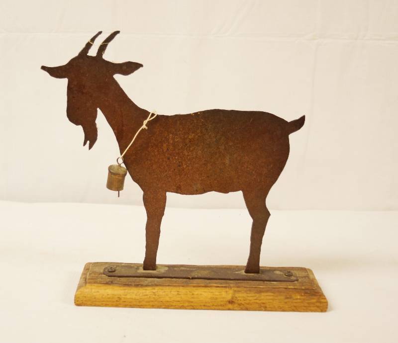 lot 6454 image: Old Metal Goat with Bell Cut-out on Stand - Very Collectible