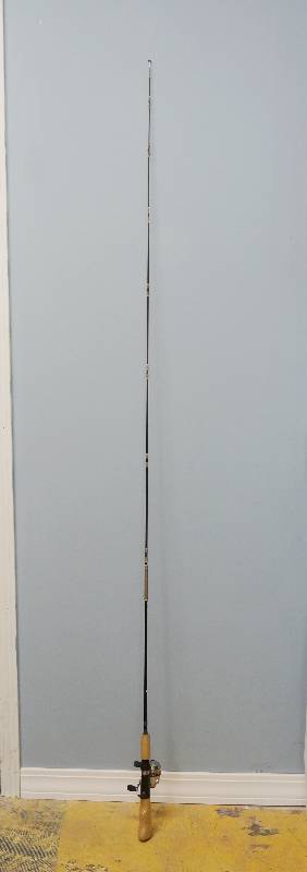 lot 4444 image: Cummins Fishing Pole 2-6 LB (handles still wrapped plastic) w Shakespeare Reel