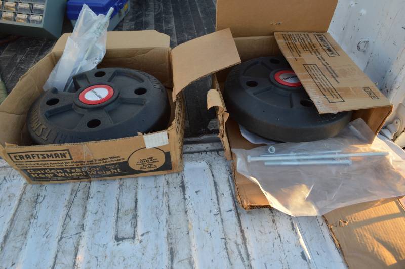 lot 3145 image: Pair of craftsman garden tractor rear wheel weights