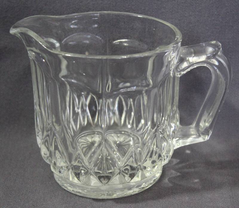lot 9750 image: 3-12 Clear Glass Creamer with Star Bottom