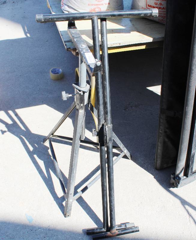 lot 3038 image: Two stands- one is a welded keyboard stand- the other was supposed to be a roller stand but does not have rollers